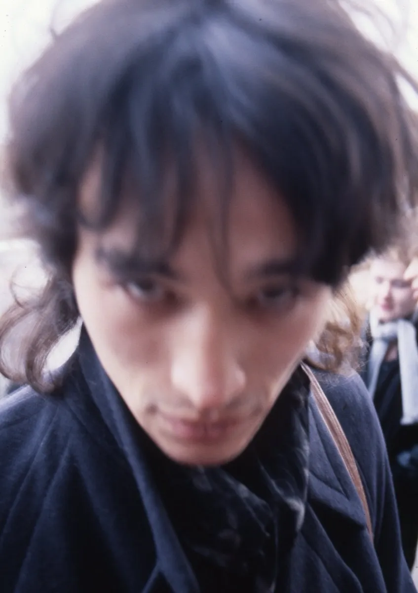 Viktor Tsoi outside Dom Knigi, Leningrad, April 1986